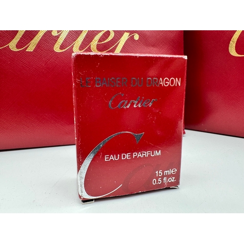 3 - Two Cartier Gift Bags with products including Delices de Cartier, Le Baiser Du Dragon Perfum, Soaps ... 