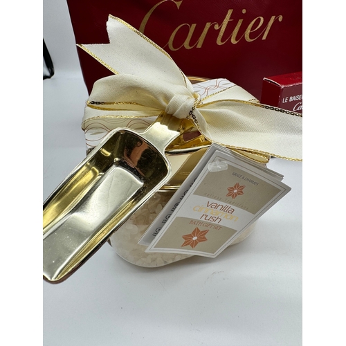 3 - Two Cartier Gift Bags with products including Delices de Cartier, Le Baiser Du Dragon Perfum, Soaps ... 