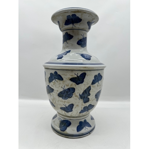 74 - Vintage Oriental Blue & White Bulbous vase with hand painted butterfly decoration - 34cm x 18cm