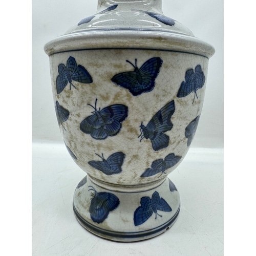 74 - Vintage Oriental Blue & White Bulbous vase with hand painted butterfly decoration - 34cm x 18cm