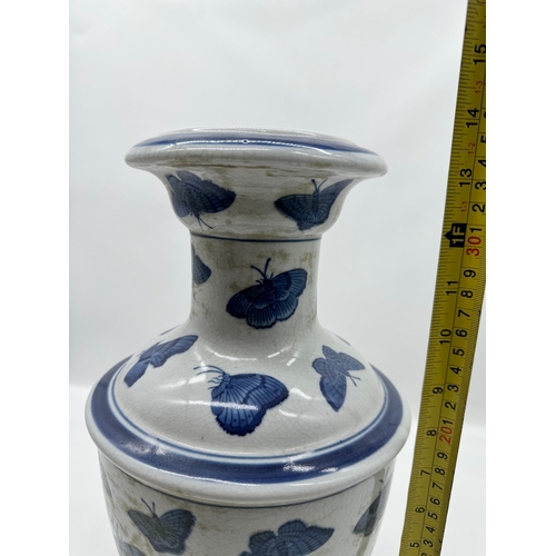 74 - Vintage Oriental Blue & White Bulbous vase with hand painted butterfly decoration - 34cm x 18cm