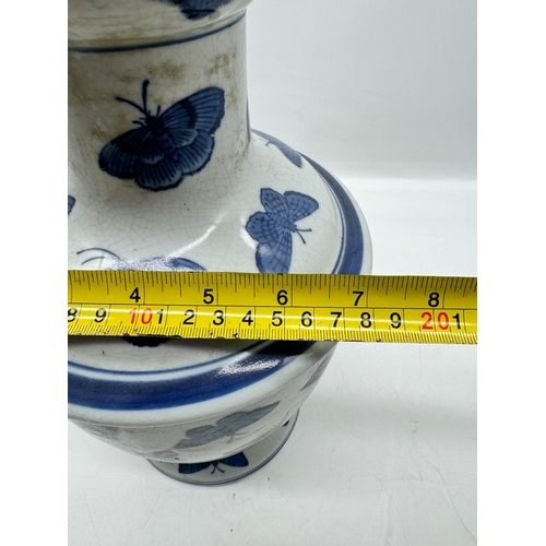 74 - Vintage Oriental Blue & White Bulbous vase with hand painted butterfly decoration - 34cm x 18cm