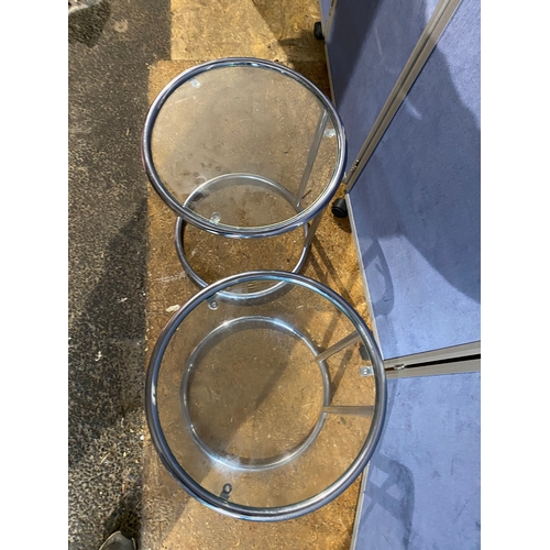 409 - A pair of Tempered glass and chrome side tables. 

Dimensions - 18