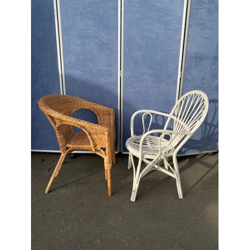 426 - Two wicker/ Cane arm chairs. 

Please see images for all dimensions.