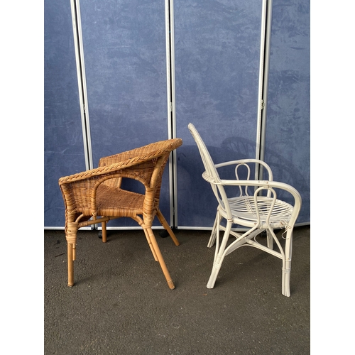 426 - Two wicker/ Cane arm chairs. 

Please see images for all dimensions.