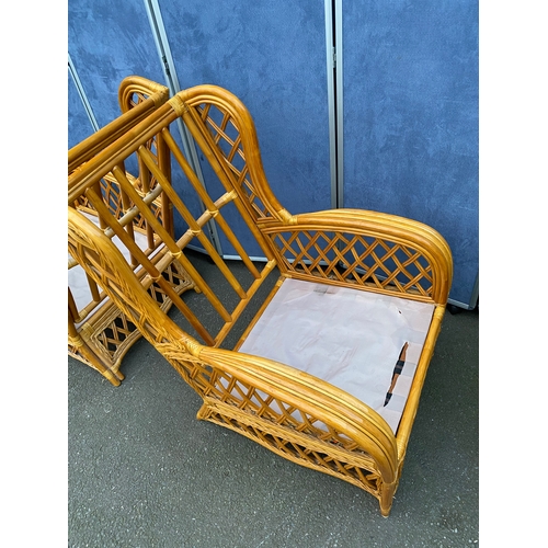 430 - A pair of wicker/Cane armchairs. 

Dimensions - 29