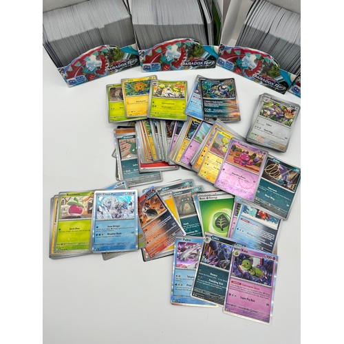 65 - Large quantity of Pokemon Trading Cards Paradox Rift including commons, uncommon, rare, reverse holo... 