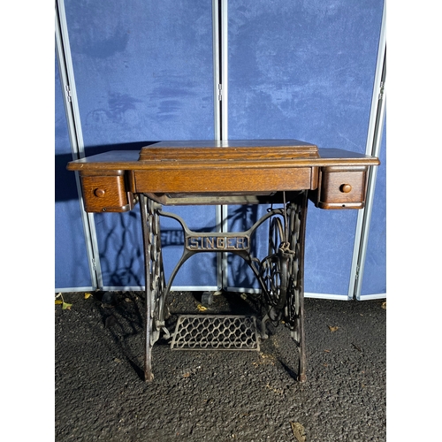 331 - Antique Singer sewing machine and table.