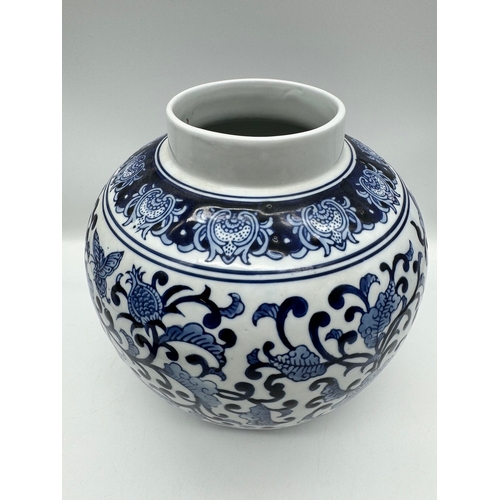 106 - 20th century blue & white oriental style ceramic bulbous vase - 35cm