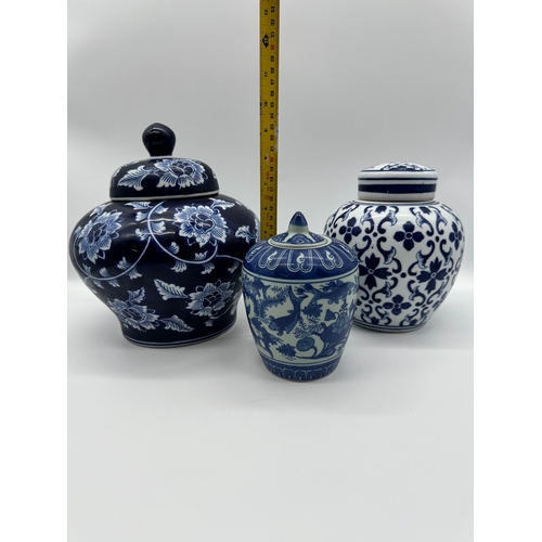 112 - three modern oriental inspired ceramic lidded ceramic vases