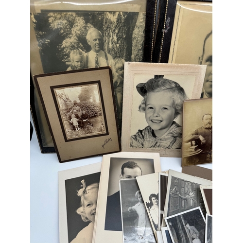 119 - Quantity of black & white family photographs with some original military photographs / postcards & 1... 