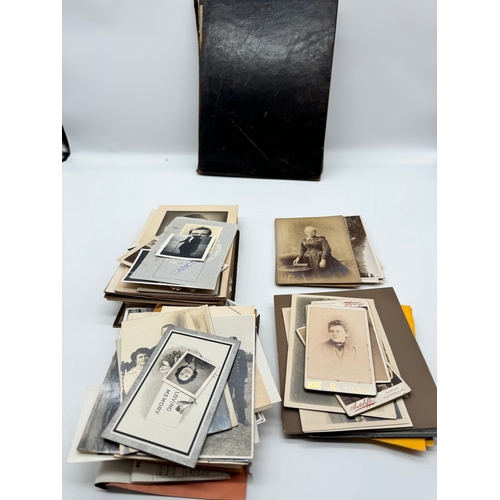 119 - Quantity of black & white family photographs with some original military photographs / postcards & 1... 