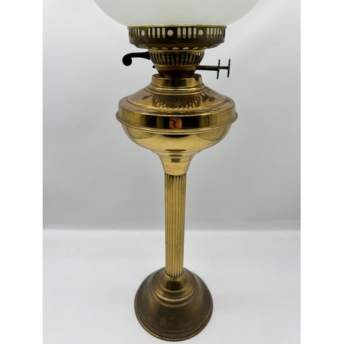 138 - Vintage Brass Parafin Column Lamp with acid etched design on glass globe - approximately 70cm