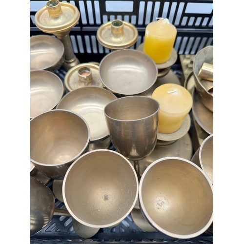 141 - Quantity of brass goblets / candle holders etc