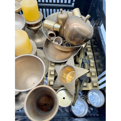 141 - Quantity of brass goblets / candle holders etc