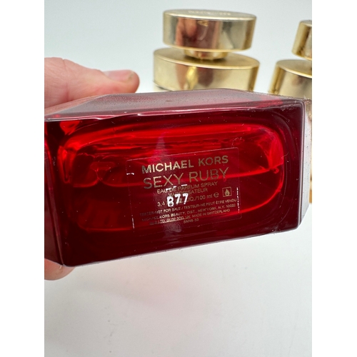 264 - Three Michael Kors Fragrances Sexy Ruby Parfum + 2 x Wonderlust 100ml