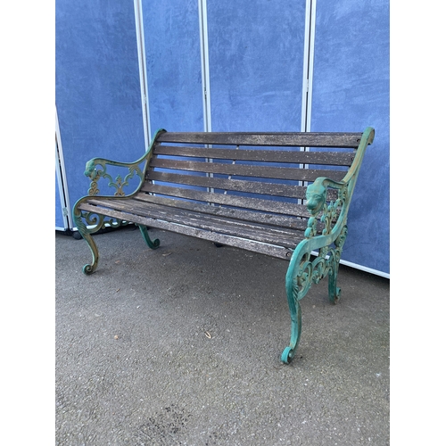 440 - Vintage garden bench with cast iron Lion head design arms. 

Dimensions - 49.5