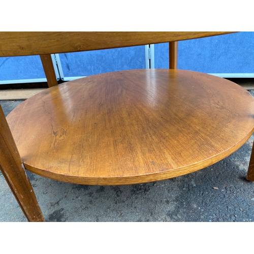 458 - Mid-Century Smoked glass Round Teak coffee table by Remploy. 

Dimensions - 32