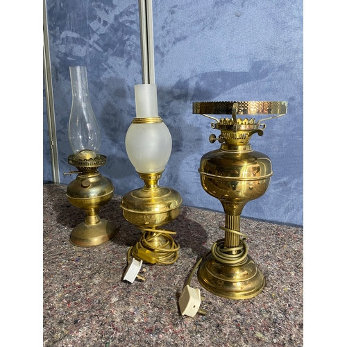 473 - A trio of Brass oil burner style lamps. (Two Electric)