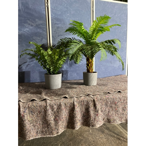 478 - Two artificial display plants.