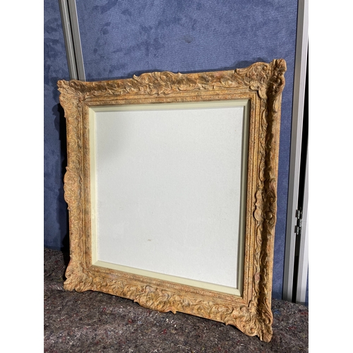 512 - Ornate wooden frame and blank canvas board. 

Dimensions - 22