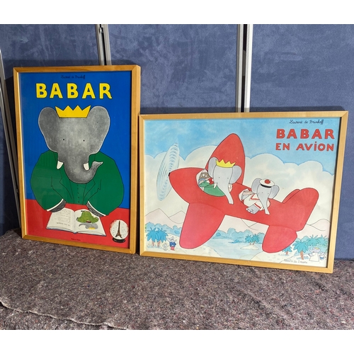 572 - A pair of framed Babar Posters.

Dimensions - 33