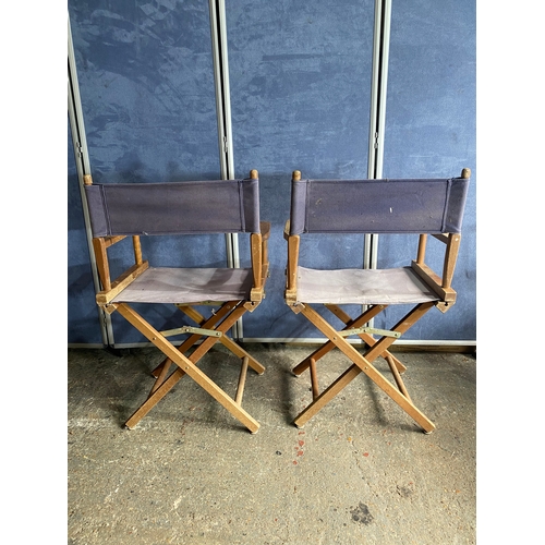 585 - Four wooden foldable directors chairs. 

Dimensions - 21