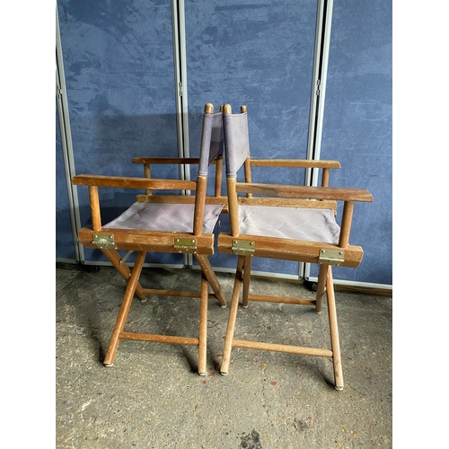 585 - Four wooden foldable directors chairs. 

Dimensions - 21