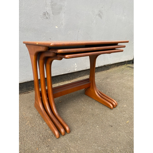 597 - G-Plan Teak nest of three tables. 

Dimensions of largest for reference - 22