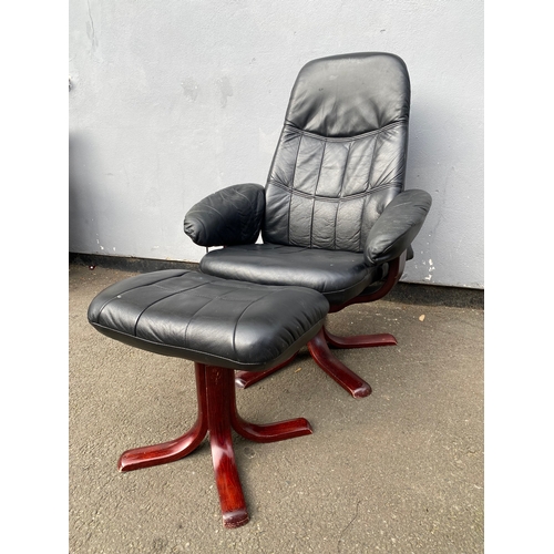 598 - Black leather swivel arm chair and footstool 

Please see images for dimensions.