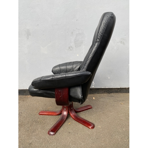 598 - Black leather swivel arm chair and footstool 

Please see images for dimensions.