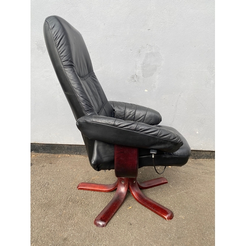 598 - Black leather swivel arm chair and footstool 

Please see images for dimensions.