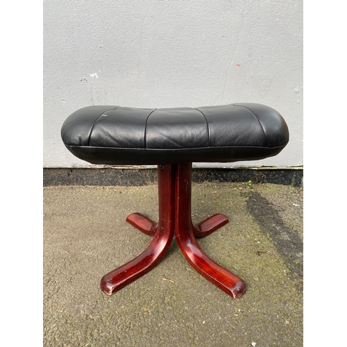 598 - Black leather swivel arm chair and footstool 

Please see images for dimensions.