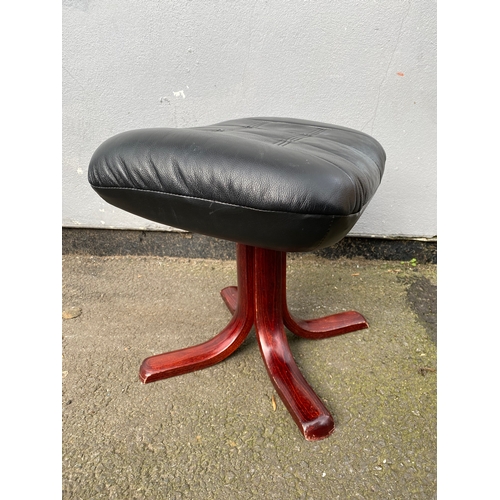 598 - Black leather swivel arm chair and footstool 

Please see images for dimensions.