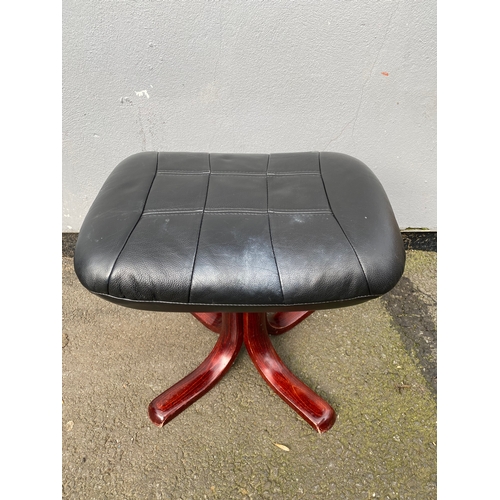 598 - Black leather swivel arm chair and footstool 

Please see images for dimensions.