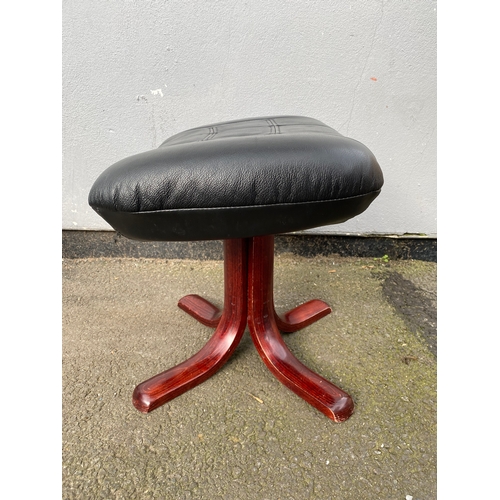 598 - Black leather swivel arm chair and footstool 

Please see images for dimensions.