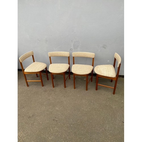 600 - Mid Century teak & Fabric Dining chairs + Modern compact dining table 

See images for all dimension... 