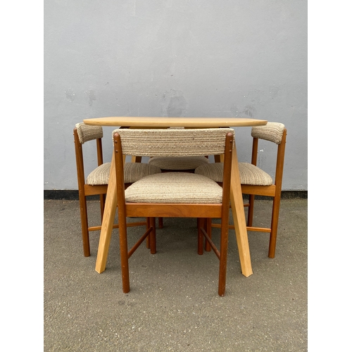 600 - Mid Century teak & Fabric Dining chairs + Modern compact dining table 

See images for all dimension... 