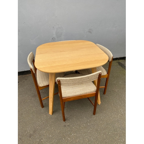 600 - Mid Century teak & Fabric Dining chairs + Modern compact dining table 

See images for all dimension... 