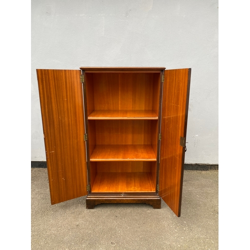 605 - Vintage three shelf storage cabinet. 

Dimensions - 16