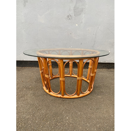 614 - Bamboo/cane style glass top low coffee table 

Dimensions - 27.5