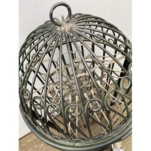 616 - Very interesting Bird cage design wine rack. 

Dimensions - 20.5