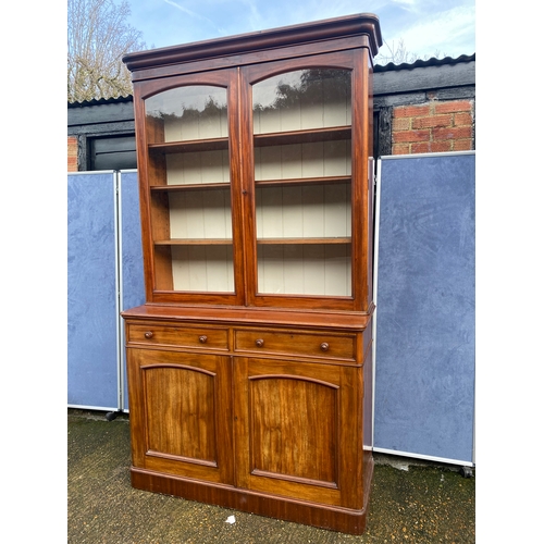 305 - Large Antique mahogany glazed front book case over cupboard 

Please see images for dimensions. Does... 