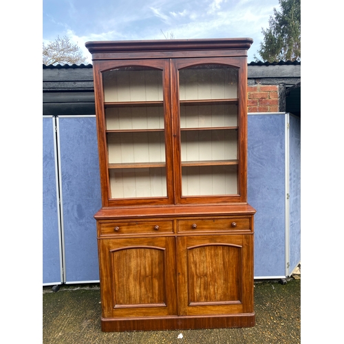 305 - Large Antique mahogany glazed front book case over cupboard 

Please see images for dimensions. Does... 