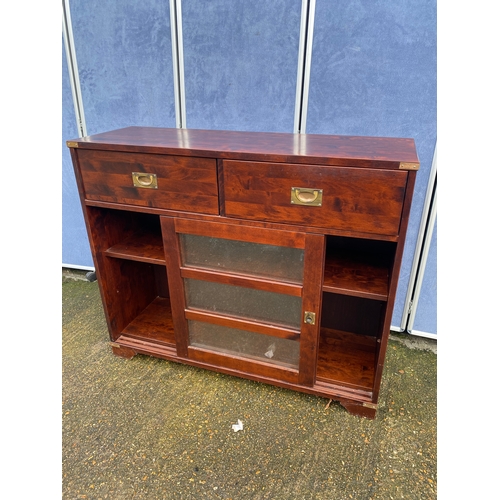 306 - Campaign style bookcase with two drawers. 

Dimensions - 47.5