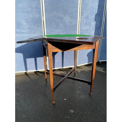 340 - 19th century Rosewood and strung envelope card table with h9inged moulded edge top with scrolling fo... 