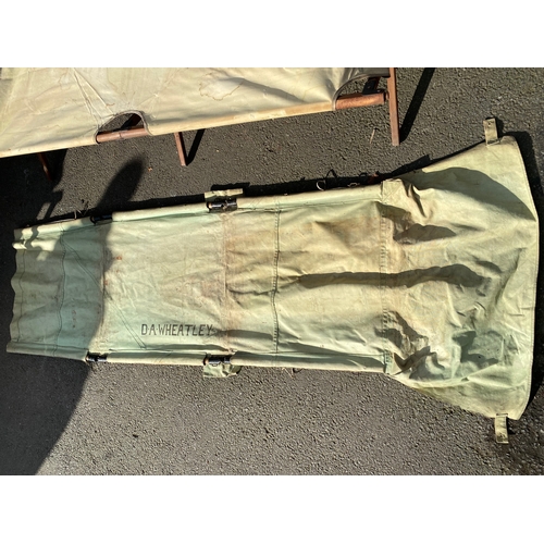 364 - A WW2 period Military canvas bed / stretcher - D A Wheatley

Please see images for dimensions.