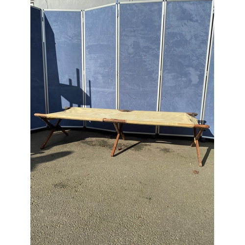 364 - A WW2 period Military canvas bed / stretcher - D A Wheatley

Please see images for dimensions.