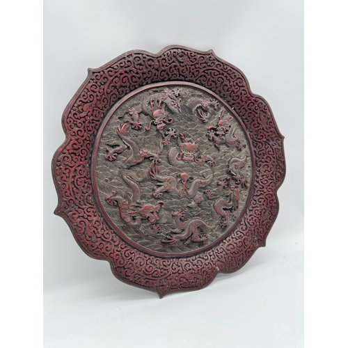 3 - 19th century Chinese Cinnabar plate / charger with Chinese dragon carvings, this plate bares a gilt ... 