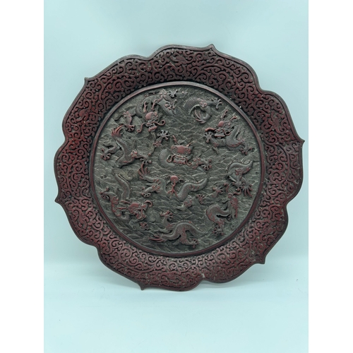 3 - 19th century Chinese Cinnabar plate / charger with Chinese dragon carvings, this plate bares a gilt ... 